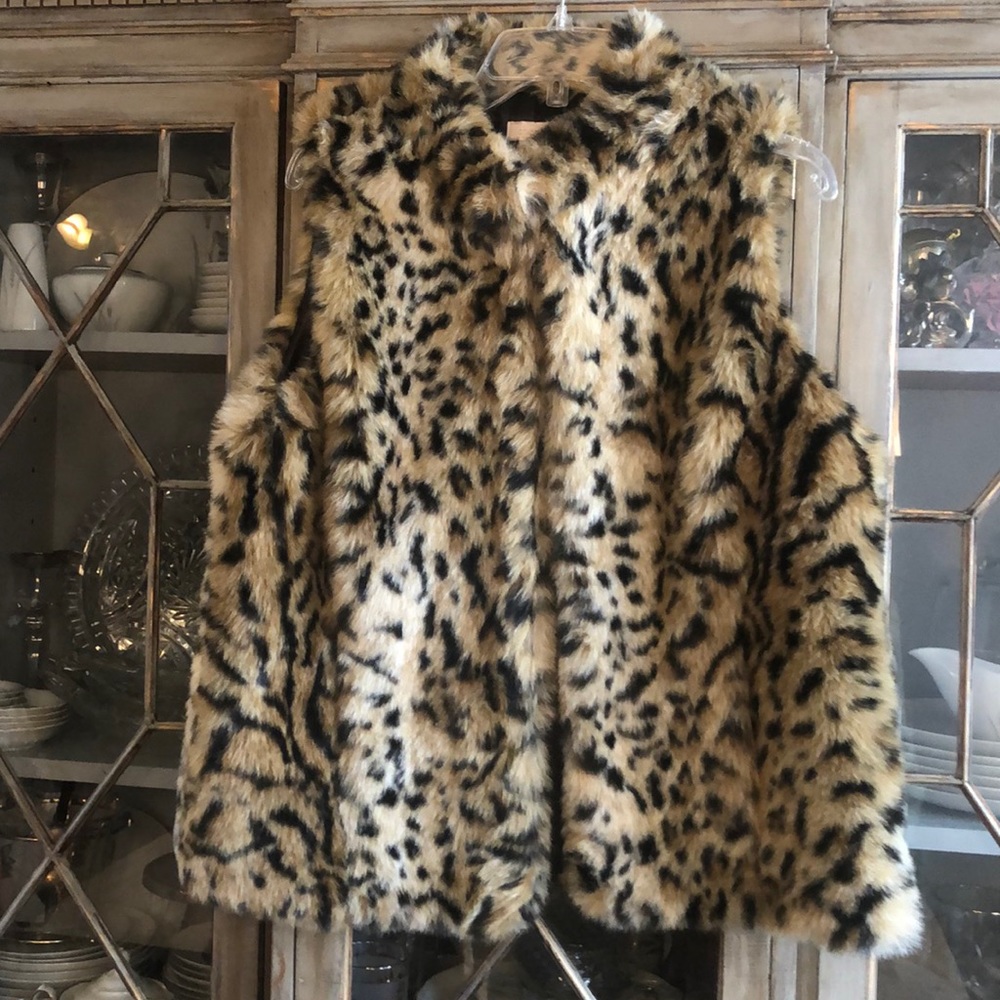 Awesome Chicos size large cheetah for vest